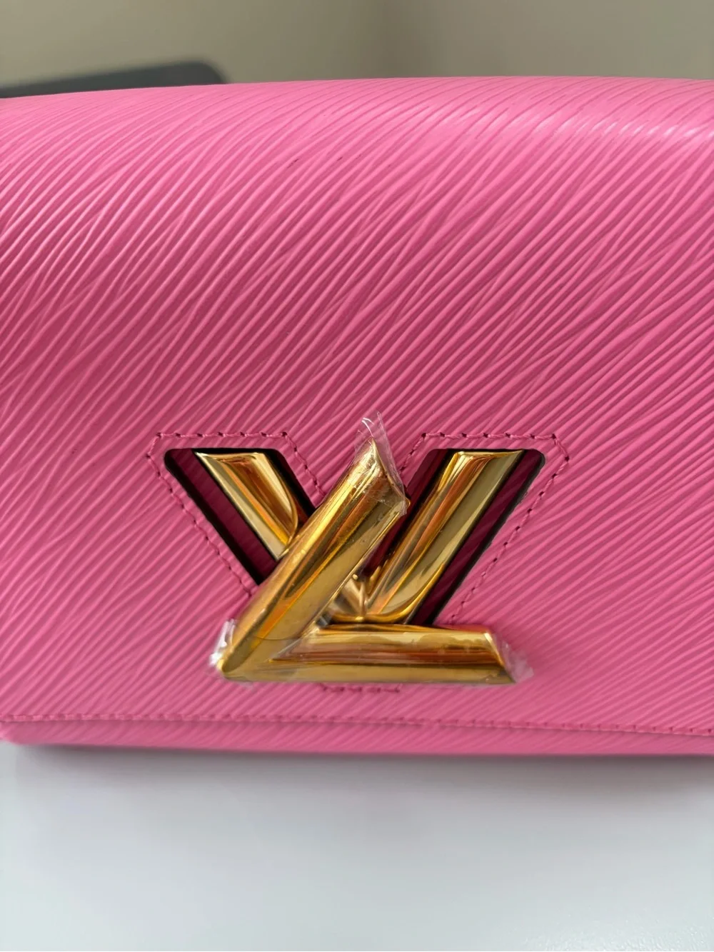 Louis Vuitton Pink Twist Compact Crossbody Bag with Gold Hardware